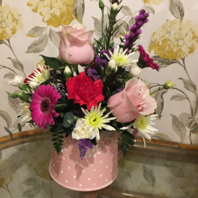 Daisy Watering Can - A pretty watering can filled with a selection of fresh flowers. Ideal for a Mother’s Day or new baby gift.